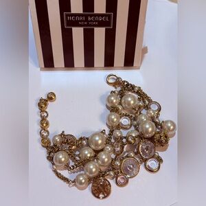 Henri Bendel “In Chaos” gold tone and pearl multi-strand charm bracelet